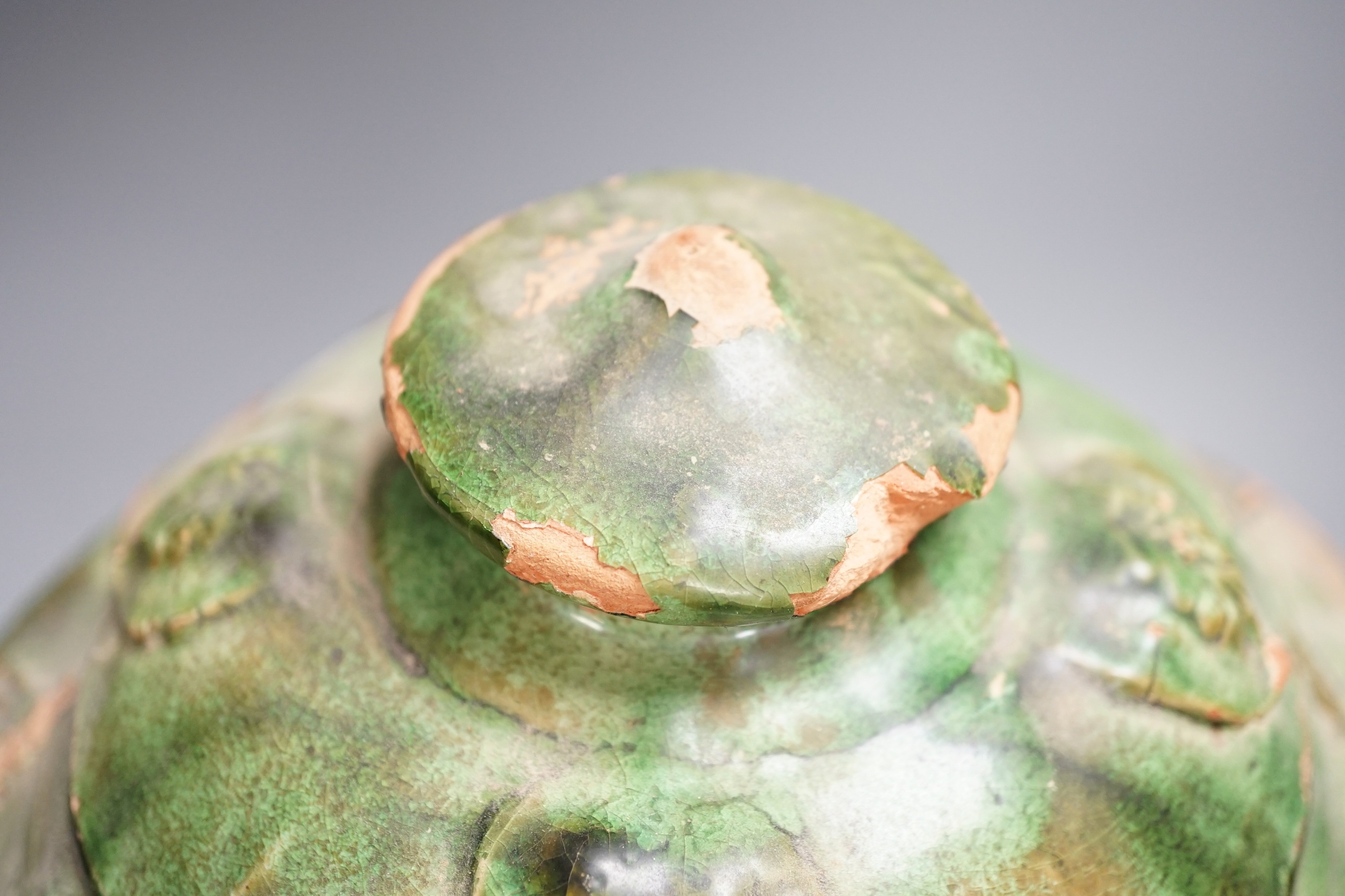 A large Chinese green glazed jar and cover, Liao dynasty, 35cm high